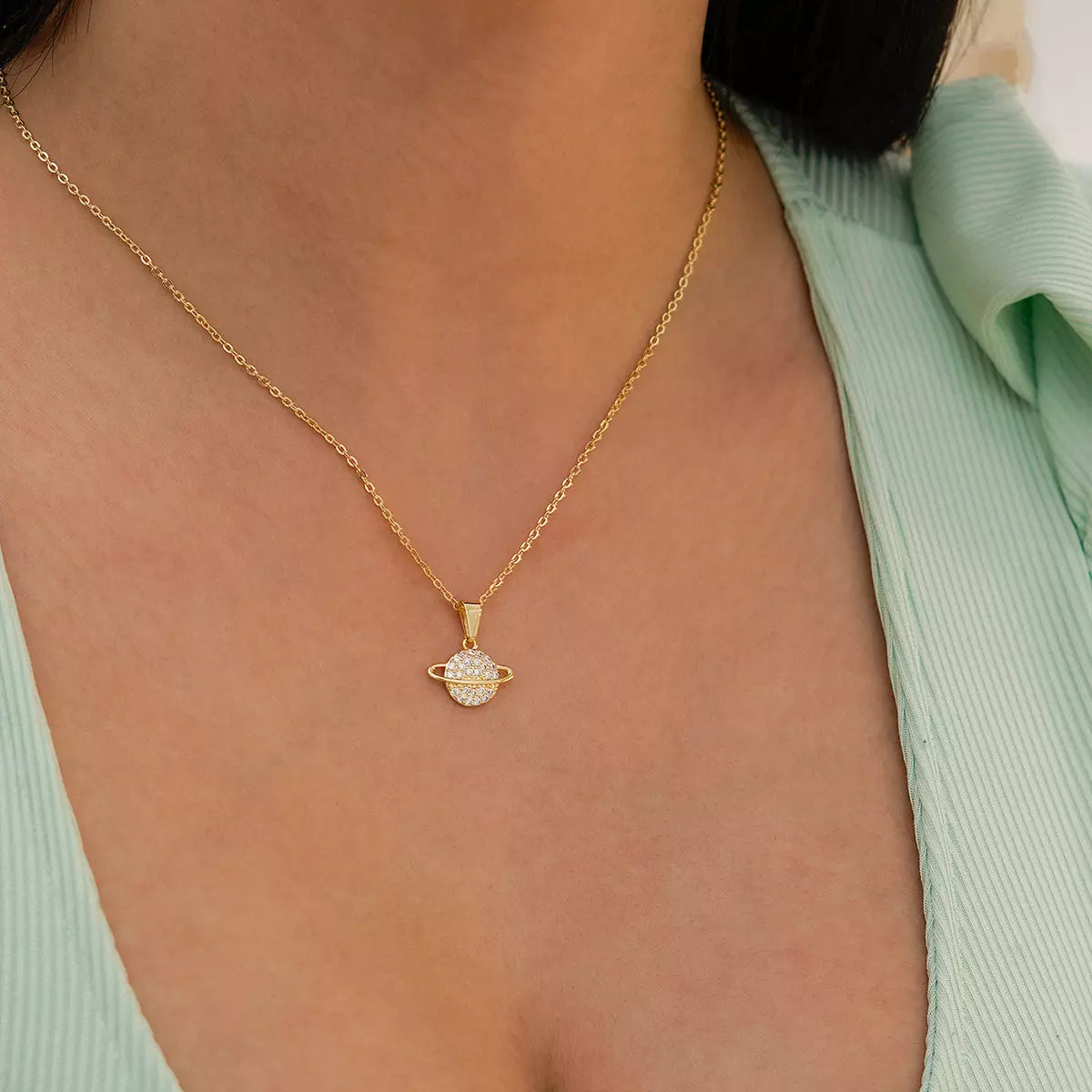 Dije Saturno Circonias Cristal